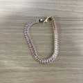 Minimalist tennis bracelet with pink rectangular zircons and golden metal finish - Pink
