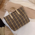 Detail of vintage plaid tote bag featuring leather handles and metal rivets on soft fabric - Yellow Coffee Plaid