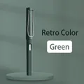 Inkless eternal pencil in vintage green finish with ergonomic grip on matching stand - Small Rod HB / Retro Green