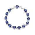Elegant silver bracelet featuring AAA blue teardrop cubic zirconia for bridal wedding wear - Blue