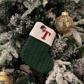 Green knit Christmas stocking with white cuff and red embroidered letter T ornament - Green/Letter T