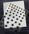 Adhesive black star gems for face and eye makeup on a transparent backing sheet - MX-39 Black Star