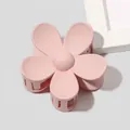Detail of a large matte pink flower hair claw clip with a minimalist five-petal design - Matte Flower Hair Clip - Nude Pink