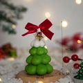 Green Christmas tree scented candle with red ribbon bow on a round wooden base - Christmas Tree Type D (Green)