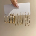 Close-up of five pairs of textured gold C-shaped hoop earrings on a display card - 14# Silver Pin (10-Piece Set) / Gold