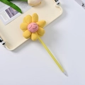 Cute yellow sunflower ballpoint pen with plush smiley face and bright plastic body - Yellow