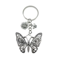 Silver bee and butterfly keychain with honeycomb and sunflower charms on round ring - Hollow Butterfly (ER545)