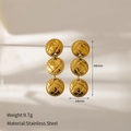 Macro detail of gold stainless steel earrings featuring three quilted round charms - Triple Disk Quilted Style (YWD2-E240) / Hoop Earrings