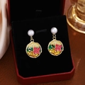 Detail of floral enamel drop earrings with red petals, green leaves and pearl studs - E7289/Red Floral Enamel Earrings