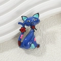 Cute blue enamel cat brooch with red flower detail and colorful patterns on metal base - Blue Cat