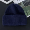 Detailed close-up of dark blue knit winter hat with premium long plush texture and softness - M (56-58cm) / Navy Blue