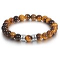 Macro shot of tiger eye beads with personalized engraved stainless steel name cylinders - Tiger's Eye / Single Name