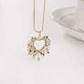 Collana a cuore dorata con zirconi colorati e motivo a raggiera scintillante - Oro Zirconia Multicolore