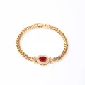 Gold plated Cuban chain bracelet with oval red gemstone and pavé zirconia detail - Gold Oval Bright Red Stone