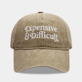 Detail of white 3D embroidery 'Expensive & Difficult' on khaki cotton baseball cap - Adjustable / Khaki