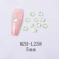 Detailed close-up of iridescent green 5mm star-shaped K9 glass rhinestones for nail art - 5-Point Star - Green Mocha (L258)