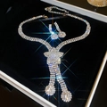 Ensemble collier avec pendentif étoile et boucles d'oreilles strass dans un coffret - Ensemble 2 pièces étoile argenté