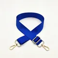 Close-up of royal blue nylon bag strap with polished gold lobster clasps and buckle - Sky Blue