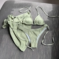 Three-piece sage green bikini set with polka dots and matching wrap cover-up skirt - Matcha Green