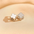 Close-up of gold clover earrings with white inlay and sparkling pavé crystals - Silver Frame White Shell & Zirconia