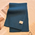 Navy blue knitted winter scarf with soft thick texture and woven designer brand label - London Blue