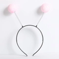 Detail of a black headband featuring metallic springs and pink glitter foam balls - Light Pink Foam Ball Headband