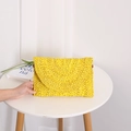 Handmade yellow straw envelope clutch with woven spiral texture for summer beach fashion - Yellow