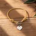 Minimalist yellow woven rope bracelet with heart pendant and silver toggle clasp - Yellow Braided Rope - OT Buckle - Heart Pendant