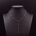 Elegant 925 sterling silver Y-shaped necklace with deep purple freshwater pearls on black model - Black Pearl Starry Copper 18K Gold Plated Necklace