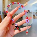 Girl's purple silicone braided hair twister with red strawberry charms and colorful beads - Straight Braid / Purple Carrot