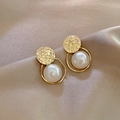Elegant gold hammered metal earrings with round pearl pendant on champagne silk fabric - Gold Round Hammered Texture Pearl Luxury Earrings