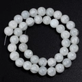 Close-up of white glass beads with ice crackle texture for DIY jewelry making - 8mm (Approx. 45 Beads) / Pale White Floral