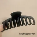 Matte black oversized 11cm hair claw clip for thick hair held in hand for scale - Matte Dragon Bone Black-11cm