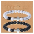 Detailed view of couple beaded bracelets with silver crosses on a brown gift card - To My Amazing Boyfriend
