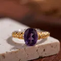Detailed close-up of S925 silver 18K gold ring with oval amethyst and side diamonds - Textured Pavé Micro-inlay (LR260)