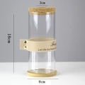 Cylindrical glass vase with cork stopper, wooden base, and leather strap detail, 18cm height - Cylinder (8*18cm) with Beige Strap & Bamboo Mat