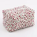 Floral makeup bag in red and white flower print with secure zip closure and large capacity - Red Floral