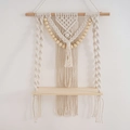 Handwoven beige macrame wall shelf with natural wooden beads and decorative fringe - Off-White Style I