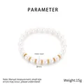 Detail view of 8mm glass pearl elastic bracelet with gold jagged spacer beads decoration - Gold Color 8MM