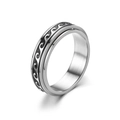 Macro detail of silver stainless steel spinner ring with black engraved wave patterns - US 6 / Wave