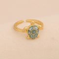 Close-up of golden sea turtle ring with turquoise shell inlay on beige fabric background - Blue Green Sea Turtle Open Ring (6#Blue)