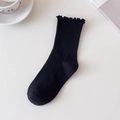 Women's black cotton socks with ruffled lettuce edge and ribbed knit texture details - One Size / Black