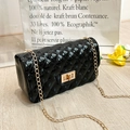 Glossy black quilted jelly bag with gold chain strap and elegant pearl handle - Black (Chain Strap)