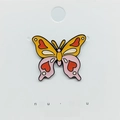 Cute butterfly enamel pin with orange and pink heart pattern on white display card - 123*Colorful Butterfly with Hearts Pin
