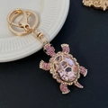 Portachiavi tartaruga affascinante in metallo dorato con cristallo rosa e strass - Rosa