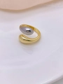 Close-up of gold horseshoe ring featuring a polished grey bead on a white surface - Gold with Grey Bead Design