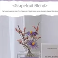 Grapefruit and rose scented diffuser with dried purple flowers in a glass bottle - Grape Seed Pomelo