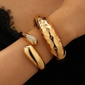 Detail of gold hammered cuff and snake bracelet set with sparkling crystals - Hammered + Snake Bangle (70) / 2 Pieces/Set (Inc. Rhinestone) / Gold