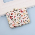 Square floral fabric mirror with pink and yellow flowers in a golden metal frame - Square / Square White