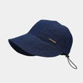 Detail of blue denim sun hat showing JHMY metal plate and adjustable black drawstring cord - One Size / Dark Blue